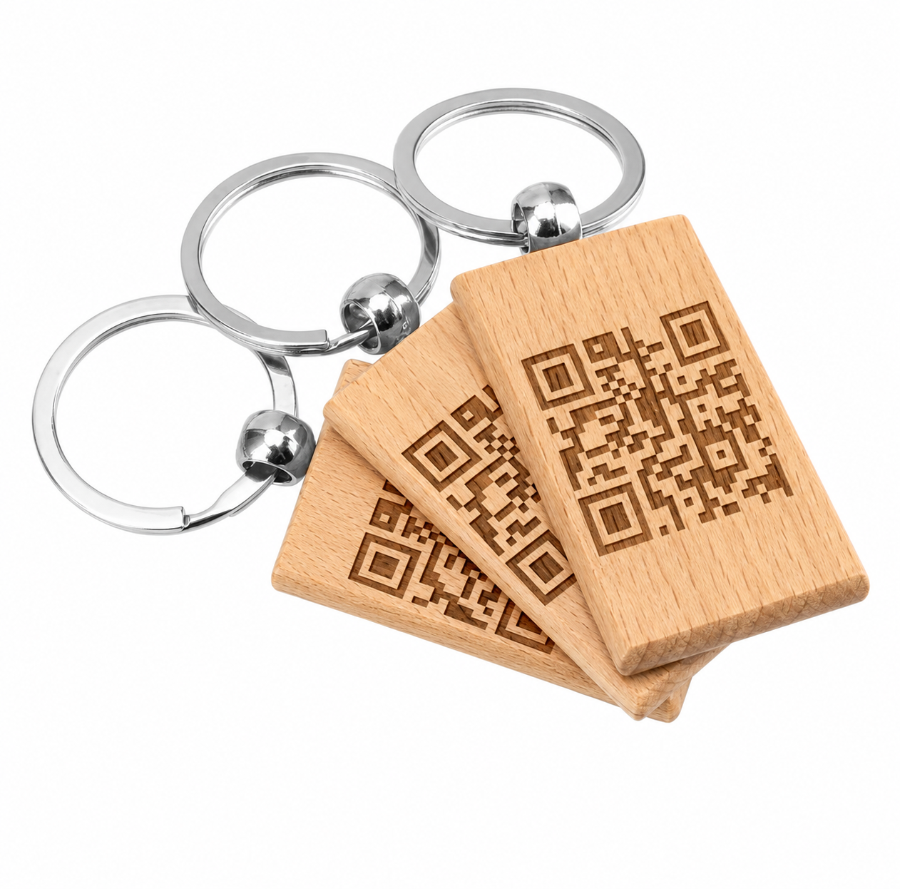 Beech wood keychains with QR codes engraved into them